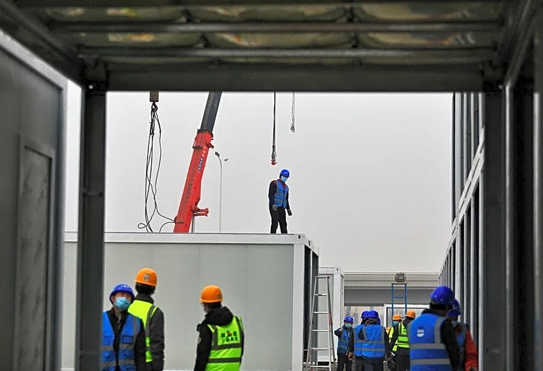 Analysis-From quarantine boxes to luxury cabins, China's prefab home factories pivot to exports
