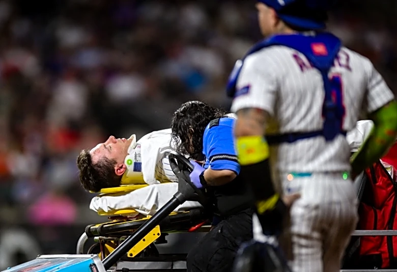 Mets 1B Jared Young (head) taken off field on stretcher