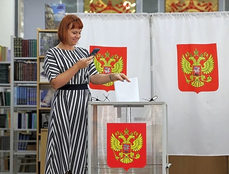 Voting begins in Russian parliamentary election which Putin has cast as barometer of support for war
