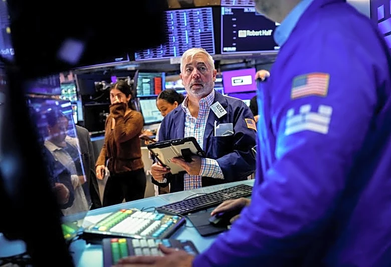 Nasdaq futures lead Wall St gains as oil retreat eases inflation worries