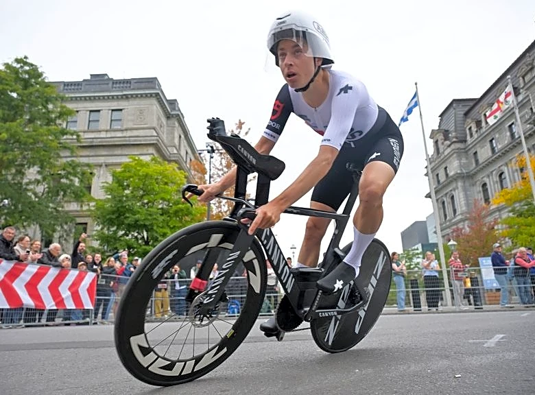 Cycling-Birthday girl Reusser retains world time trial title in Montreal