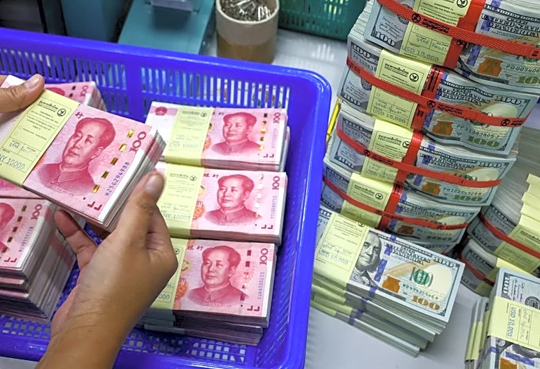 Yuan hits fresh multi-year peak as PBOC eases curb ahead of Trump-Xi summit