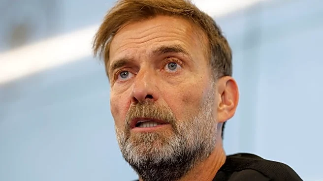 Soccer-Germany coach Klopp earns praise for split squad idea
