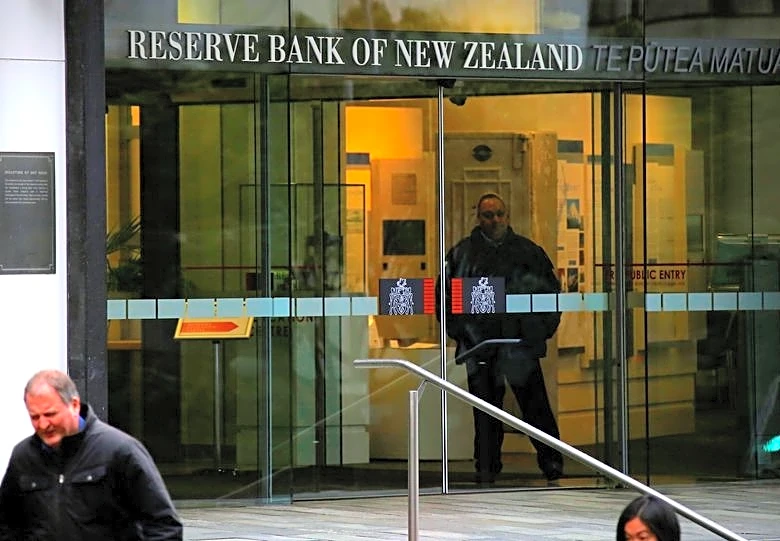 New Zealand central bank chief sees risks to economy, inflation