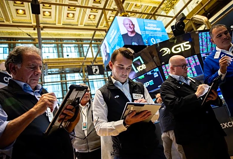 Nasdaq sets record high, oil dips on improved crude flows