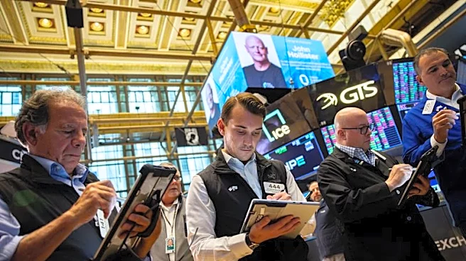 Nasdaq sets record high, oil dips on improved crude flows