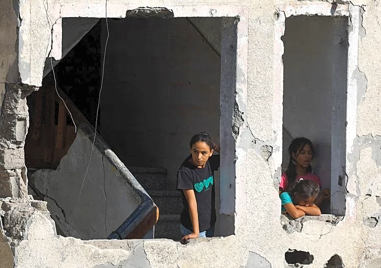 Race to evacuate war-damaged Gaza buildings after deadly apartment block collapse