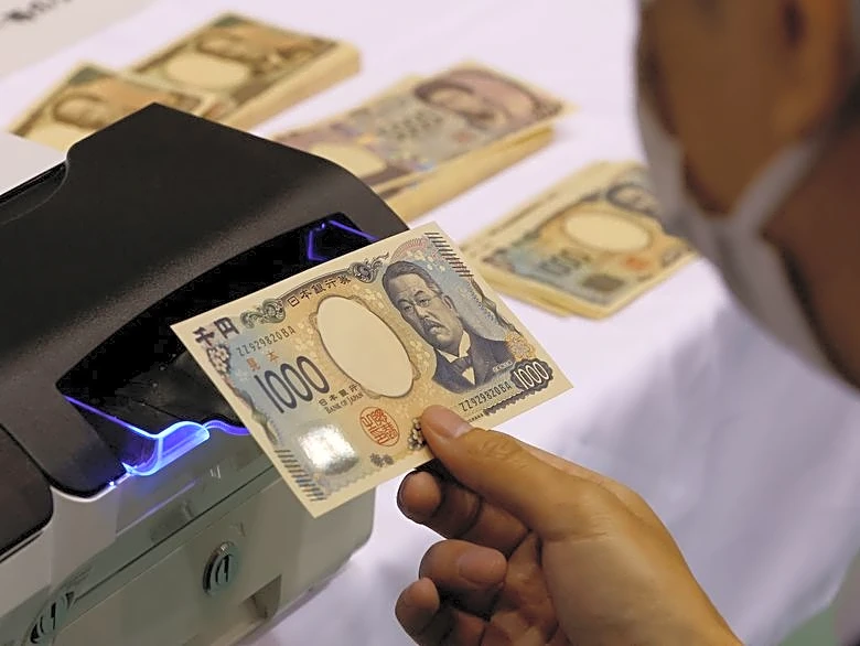 Analysis-Japan's bond 'falling knife' stalls repatriation rush