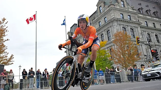 Cycling-Vollering edges rival Niewiadoma-Phinney for road race world title