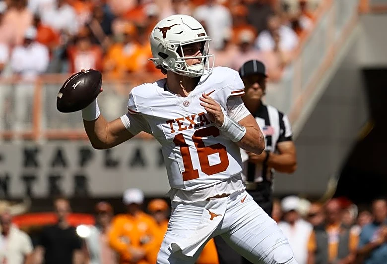 Top 25 roundup: No. 1 Texas holds off No. 14 Tennessee