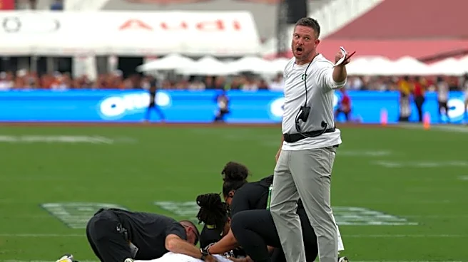 Oregon star QB Dante Moore leaves game vs. USC in ambulance