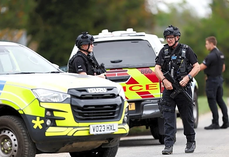 UK counter-terror police question five men held at airbase used by US to attack Iran