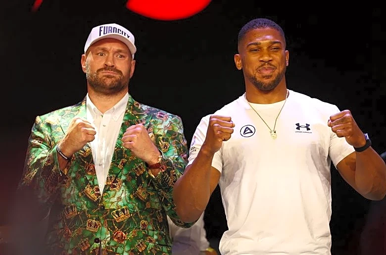 Boxing-Smiles and respect as Fury and Joshua have first face off ahead of December fight