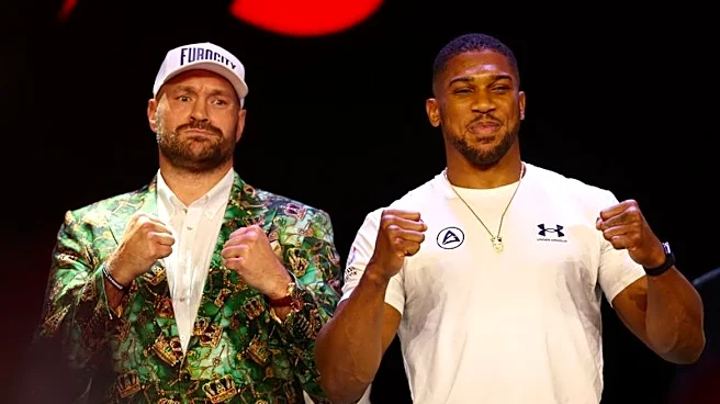 Boxing-Smiles and respect as Fury and Joshua have first face off ahead of December fight