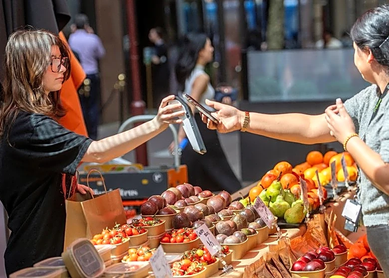Australian businesses raise prices as card surcharge ban takes effect