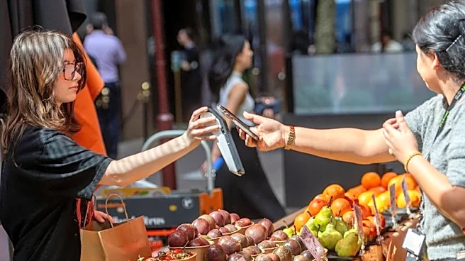 Australian businesses raise prices as card surcharge ban takes effect