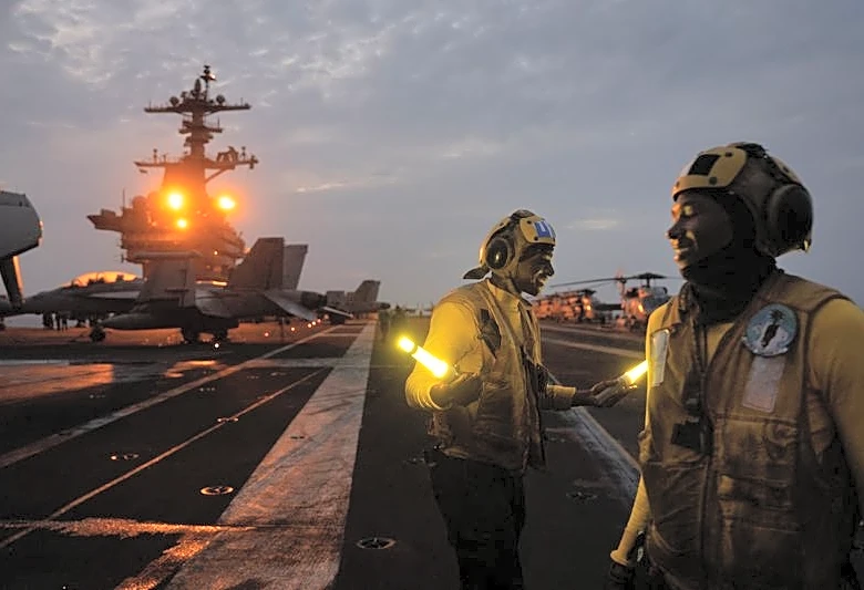 Aboard the USS George Washington, young sailors adjust to war with Iran