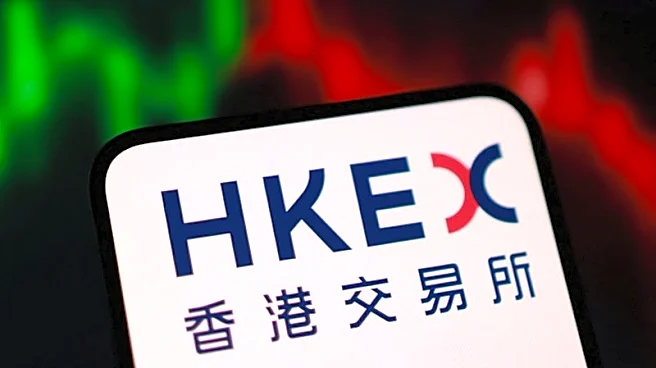 Hong Kong stocks tick down in thin trade as property, financials drag