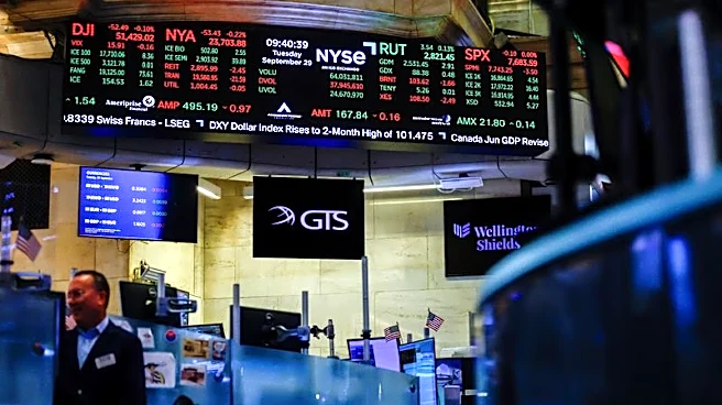 Nasdaq hits record as dollar and Treasury yields climb, oil prices ease