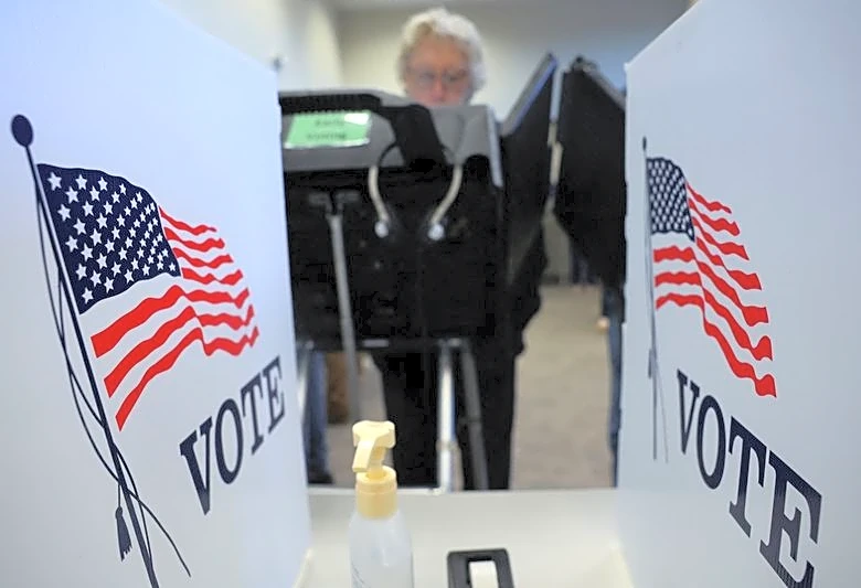 'I'm getting fed up': voters line up before dawn as early voting begins in Ohio