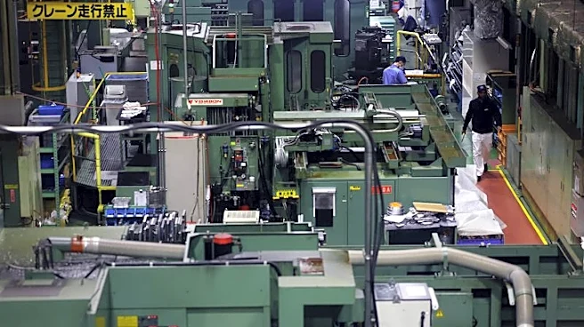Japan manufacturers' mood hits near 5-year high, service-sector sentiment slumps: Reuters poll