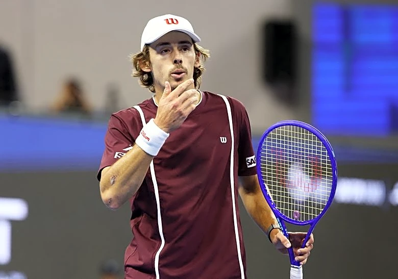 Tennis-De Minaur heads to Shanghai for scans after Beijing retirement