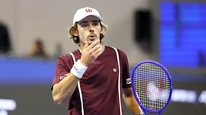 Tennis-De Minaur heads to Shanghai for scans after Beijing retirement