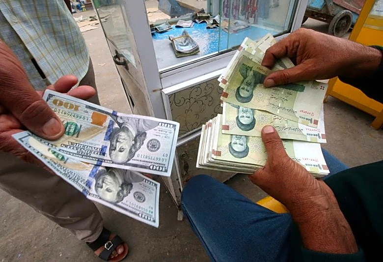 Iraq devalues dinar to 1,520 per US dollar, state news agency says