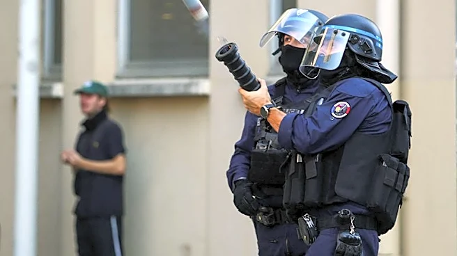 France suspends use of stun grenades to police student protests