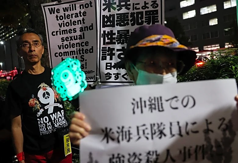 Dozens protest in Tokyo after Marine accused of murder in Okinawa