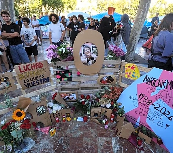 Thousands of Spaniards march to mark death of octogenarian at heart of housing protests