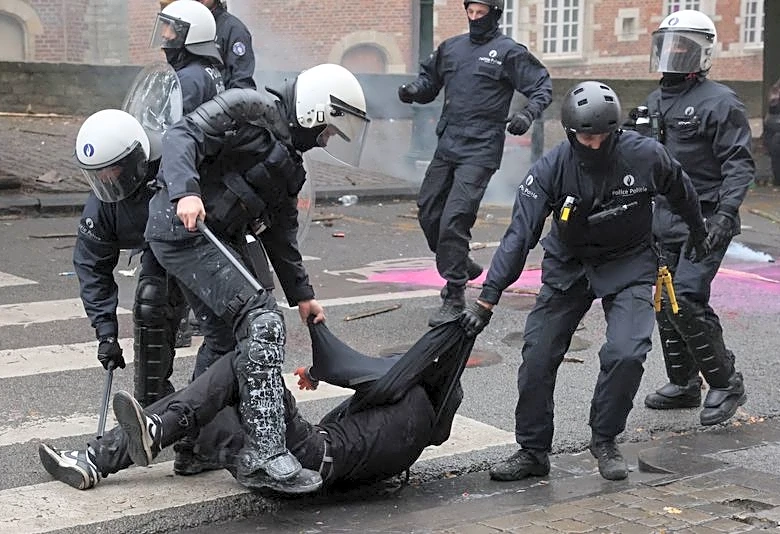 Protesters clash with police in Brussels as unions and students march