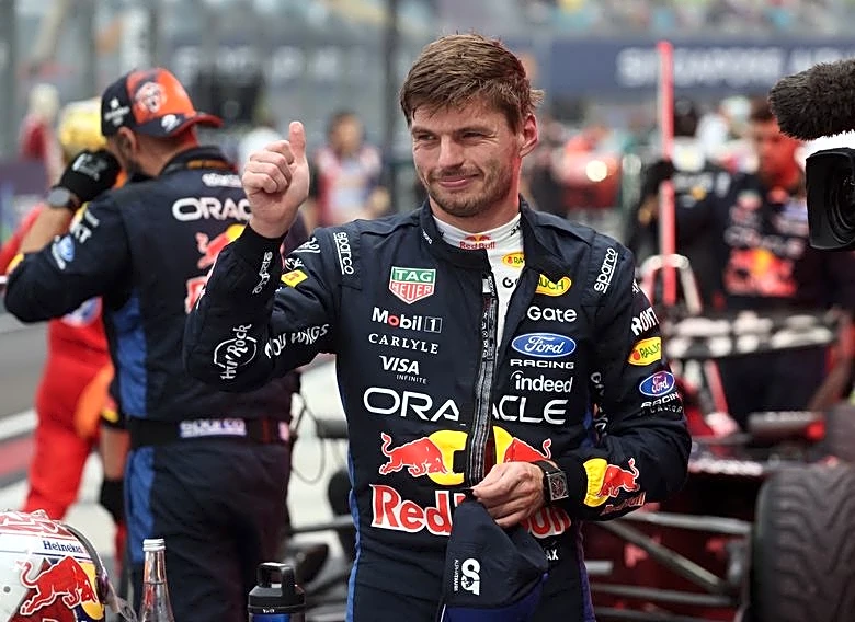 Motor racing-Verstappen claims first Singapore win as nine retirements mar chaotic sprint