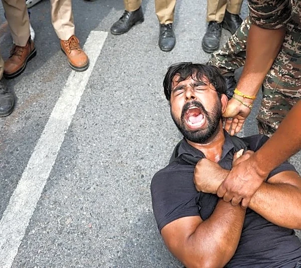 Poll chief protesters detained in Delhi as 'cockroach' youth leaders released