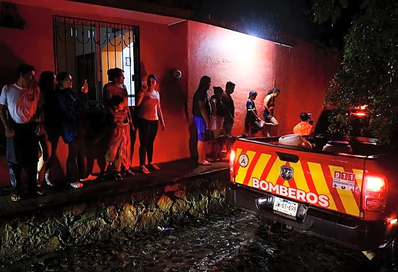 Hurricane Simon weakens to Category 3 as rains flood Mexico's Pacific coast