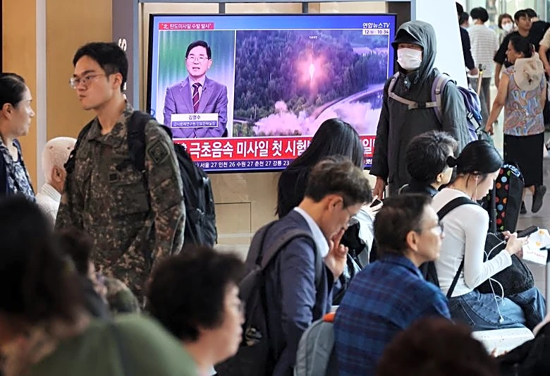 North Korea's Kim showcases missile capable of reaching US as Trump signals possible meeting