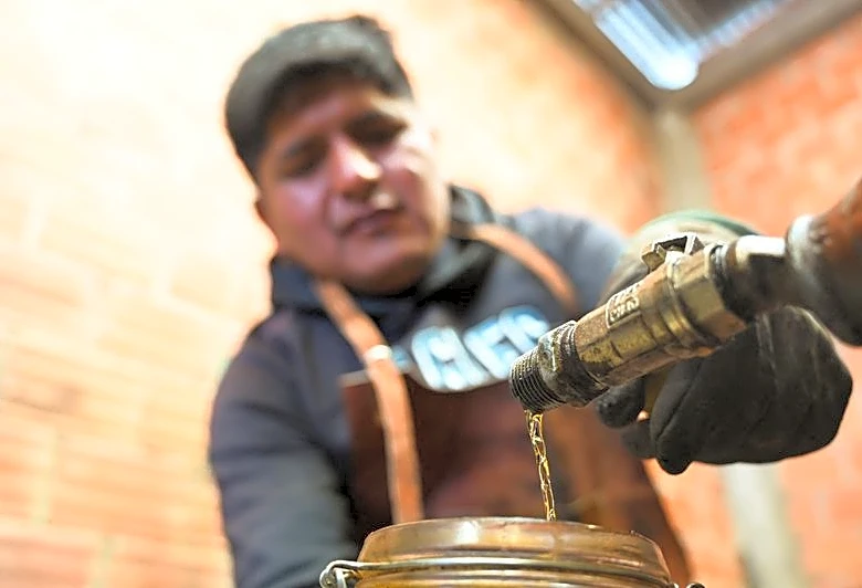 As diesel prices soar, Bolivian farmer turns trash into tractor fuel