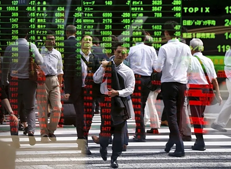 Asian markets sell off as AI trades crumble after hot US CPI data