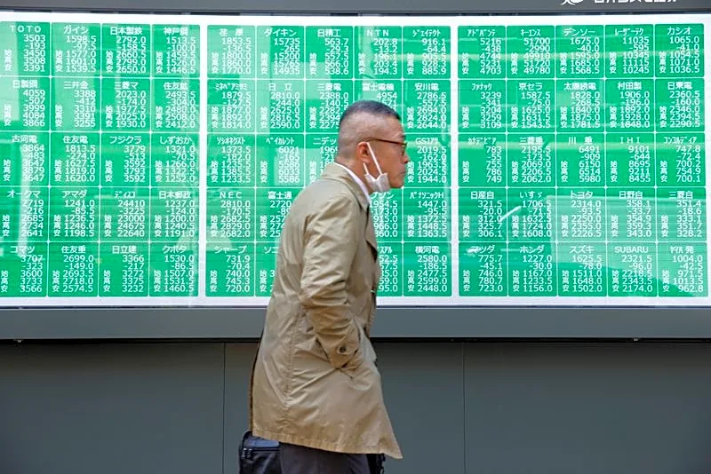 Asian stocks sell off as AI trades crumble after hot US inflation data