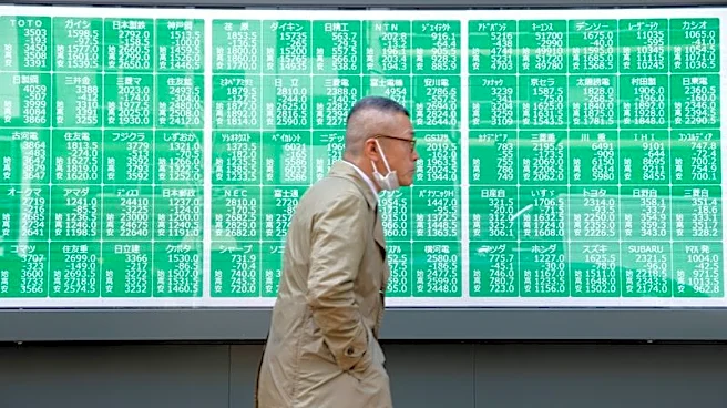 Asian stocks sell off as AI trades crumble after hot US inflation data