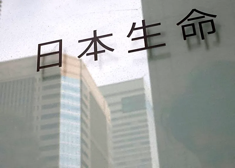 Analysis-Japanese insurers are poised to bring money back home - gradually