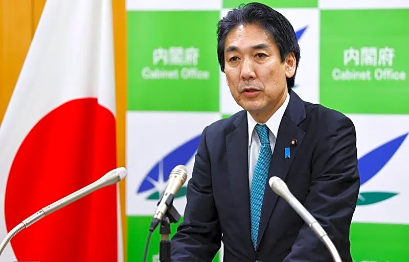 Japan economy minister says nation no longer in deflation, seeks investor rethink