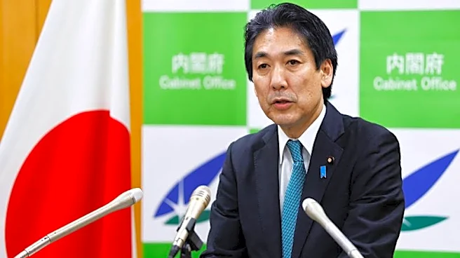 Japan economy minister says nation no longer in deflation, seeks investor rethink