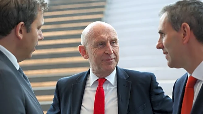 Asked on bank tax, UK's Healey stresses sector's broader contribution