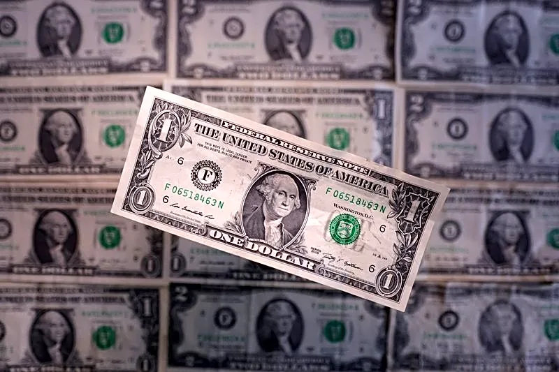 Dollar retreats from 18-month high despite strong inflation data