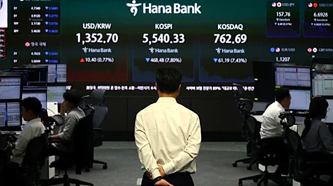 Global stocks edge lower as AI and rate fears hit tech
