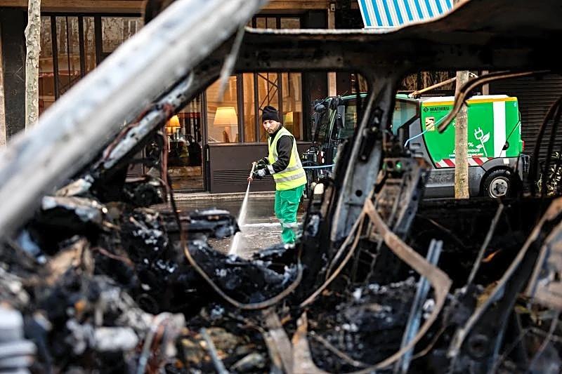 Macron urges calm as France counts the cost of worst unrest in years