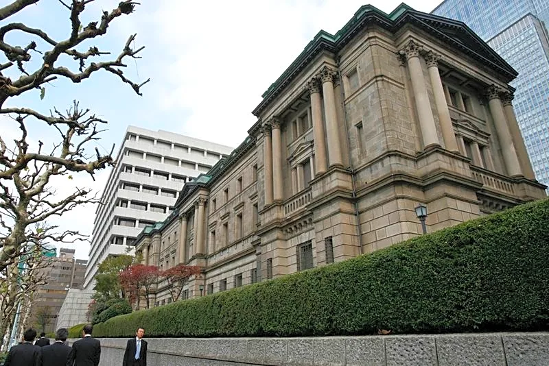 Bank of Japan may raise inflation forecast, stand pat on rates, sources say