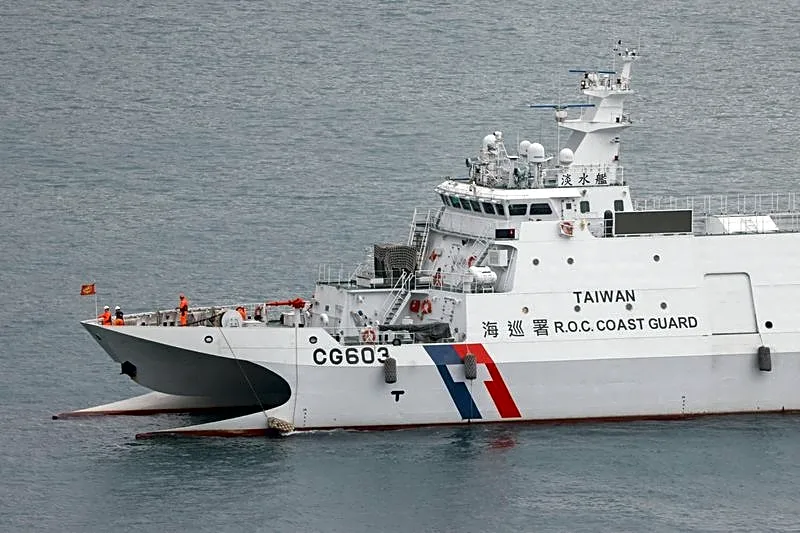China sends naval forces to monitor US warship near disputed shoal