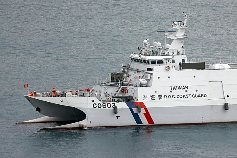 China sends naval forces to monitor US warship near disputed shoal